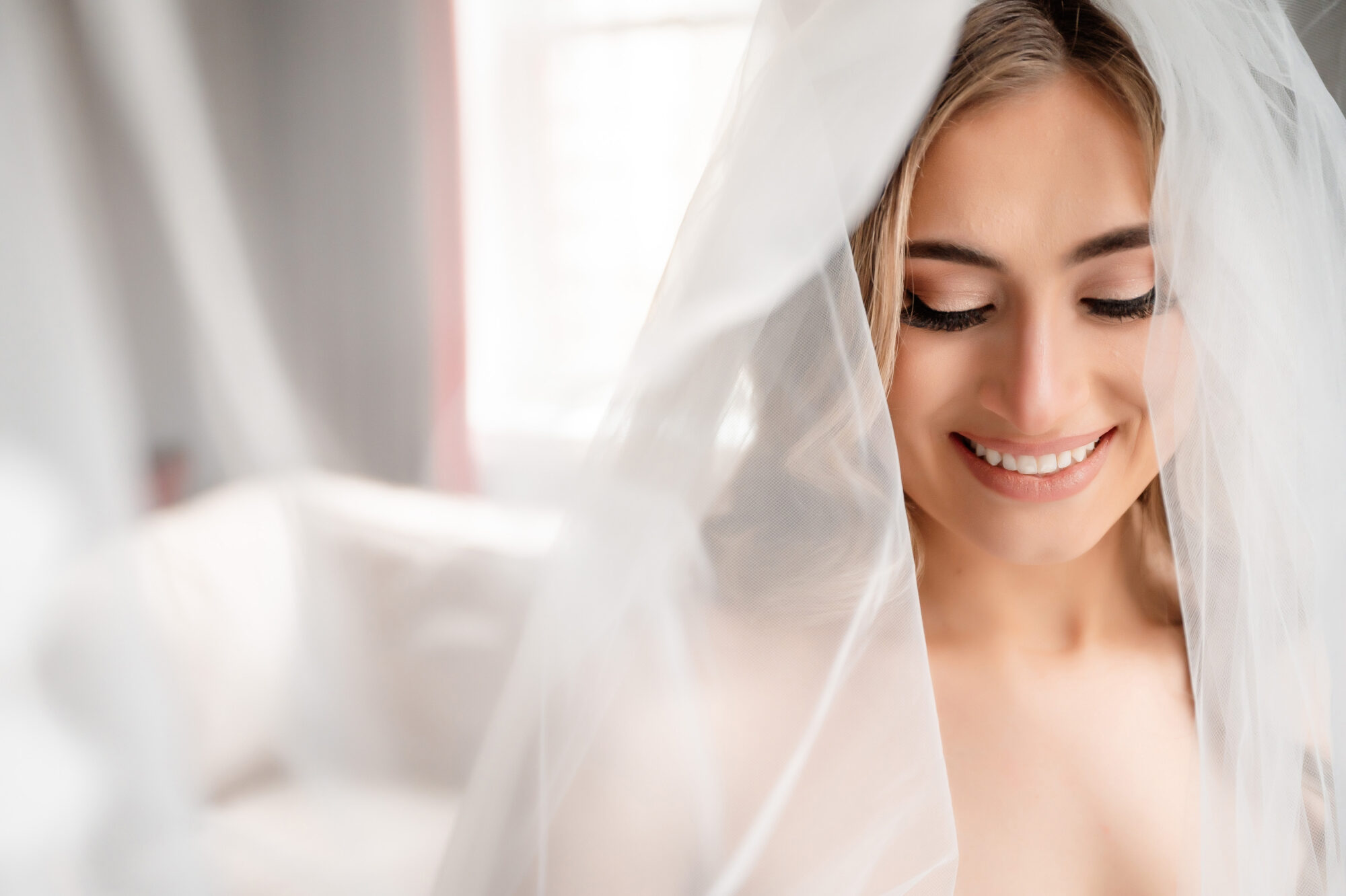 bride with wedding veil and smile • Stunning Duquesne Club Wedding Photos - An Elegant Wintery January Pittsburgh Marriage