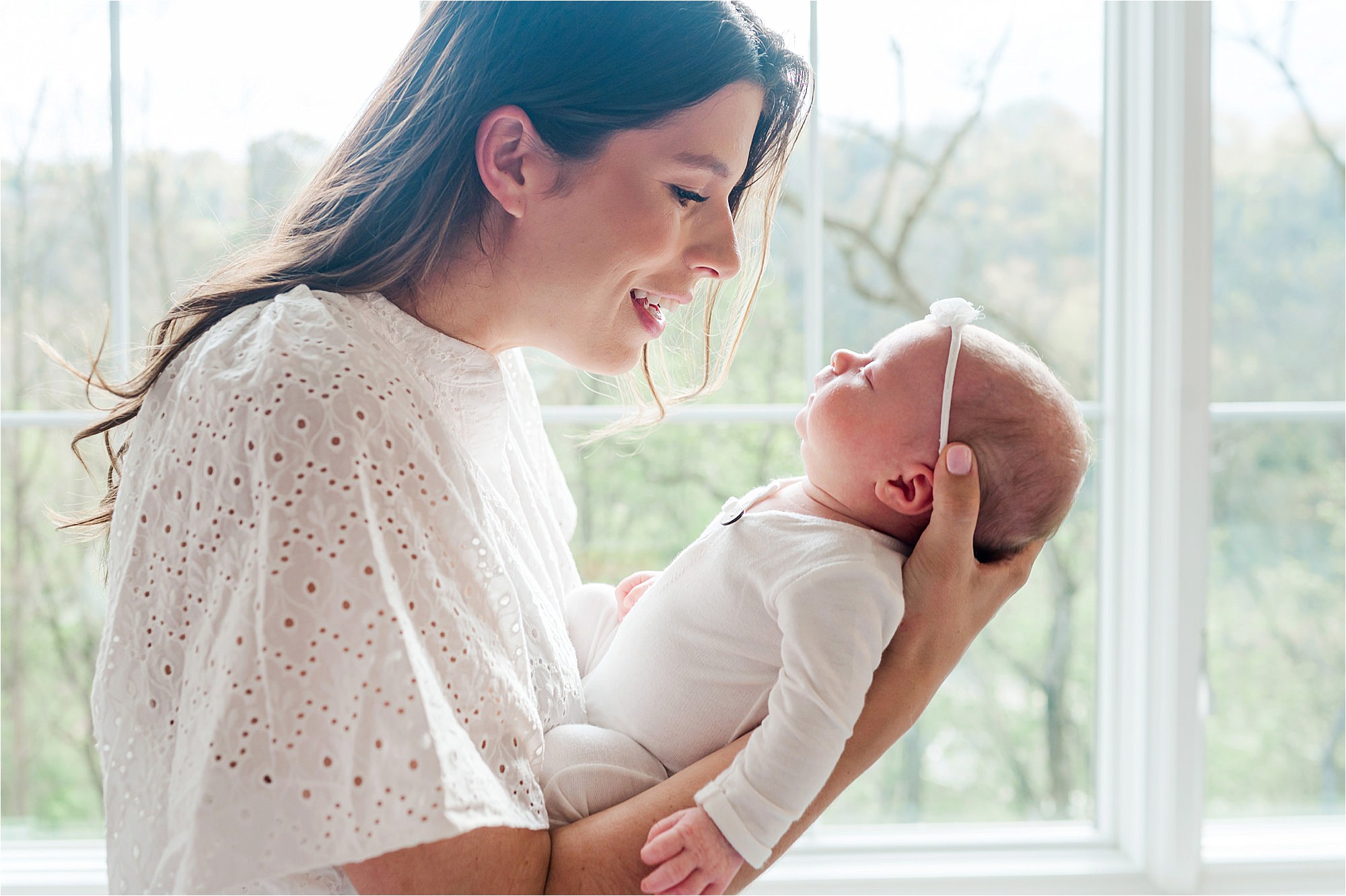 mom and baby in house newborn photos • Lifestyle In Home Newborn Photos