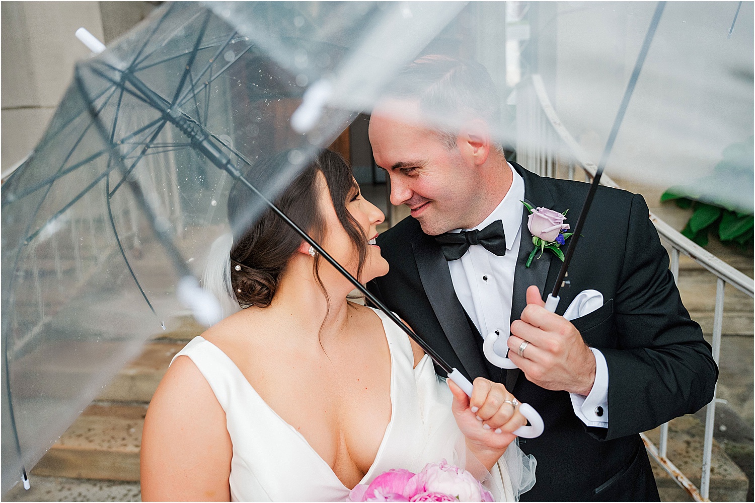 bride and groom pittsburgh rainy wedding day • Wild Weather - Love at a Phipps Conservatory Outdoor Garden Wedding