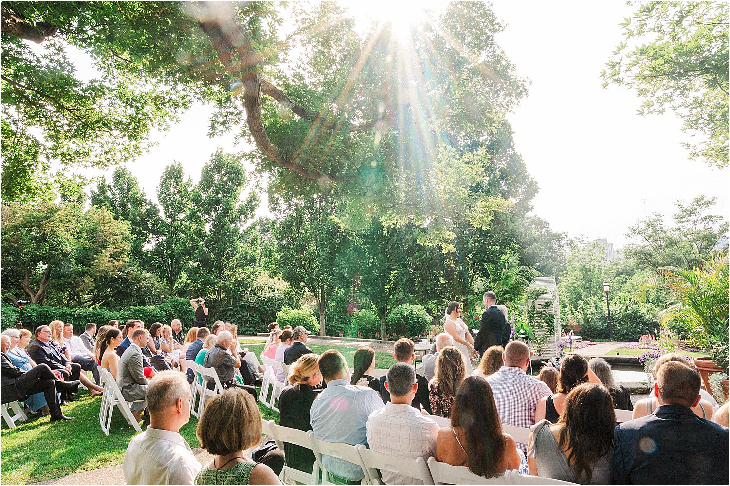 sunshine wedding ceremony phipps outdoor garden • Wild Weather - Love at a Phipps Conservatory Outdoor Garden Wedding