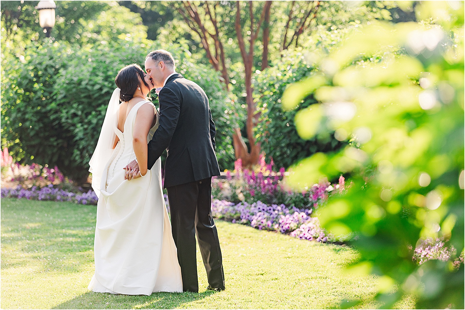 bride and groom at outdoor courtyard at phipps conservatory • Wild Weather - Love at a Phipps Conservatory Outdoor Garden Wedding