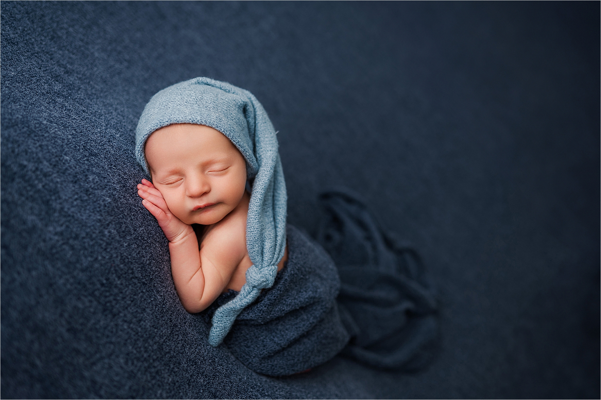 baby on blue pittsburgh newborn • Cranberry Township Newborn Photography