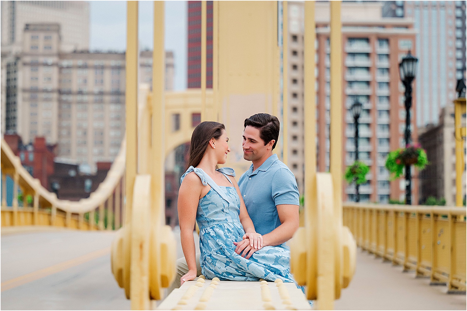 engagement photo on the andy warhol bridge • Iconic Pittsburgh Skyline North Shore Engagement Session